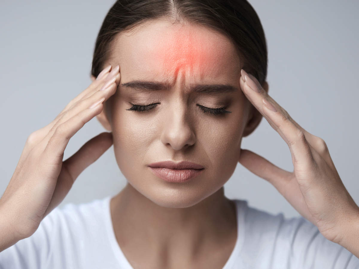 Woman experiencing a Migraine Headache