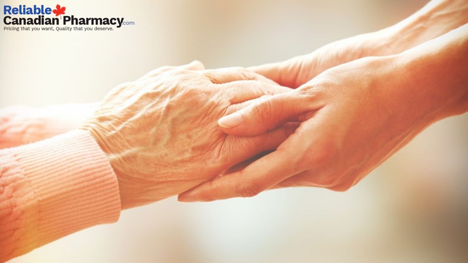 A young hand holding an old hand