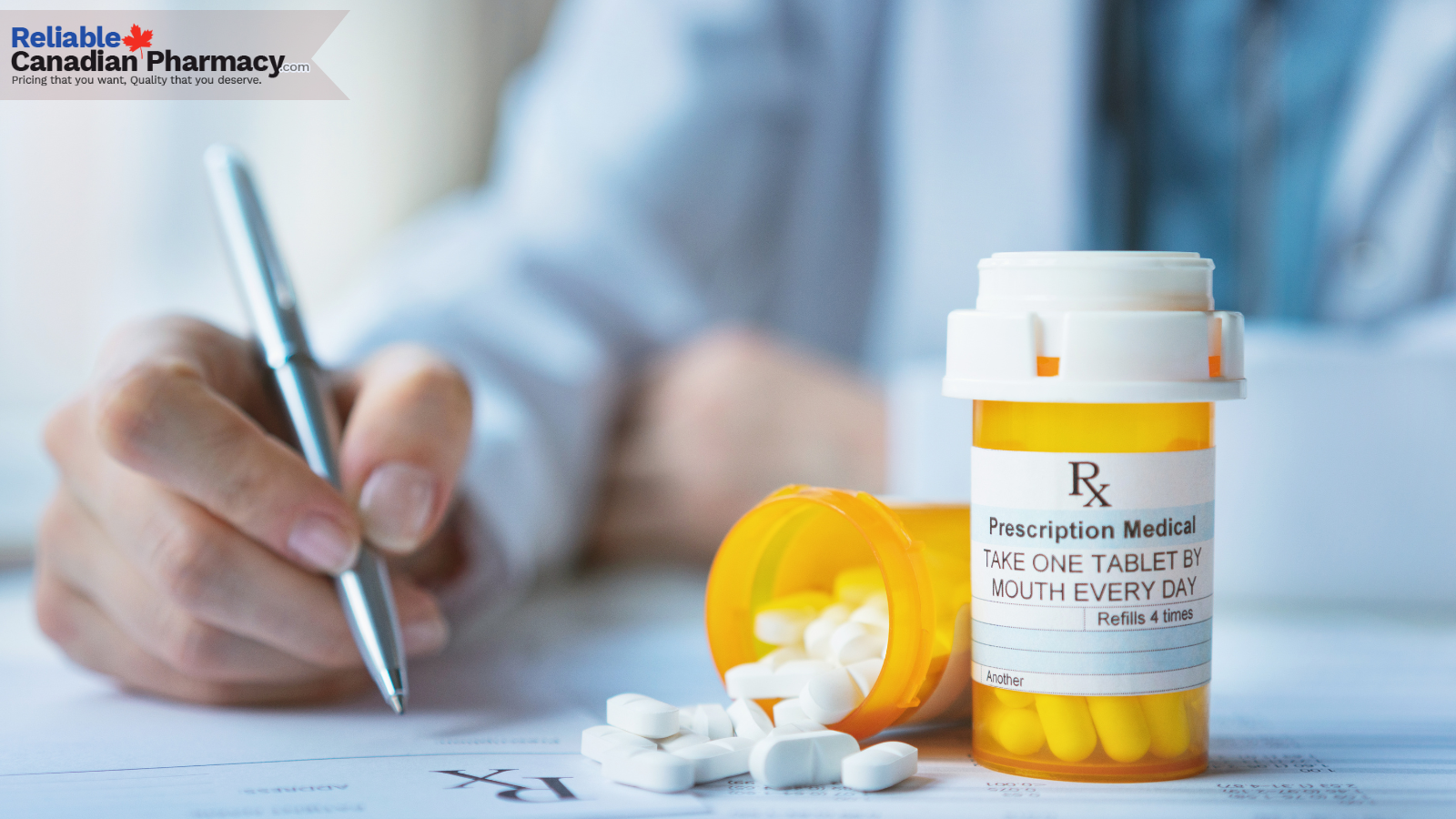 A holding a pen writing a script with medications on the table.