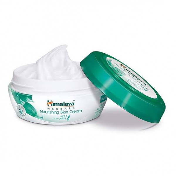 An open Jar of Nourishing Skin 100 ml Cream Himalaya