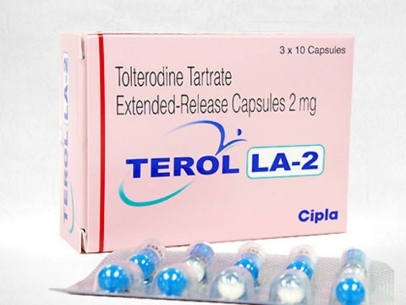 A box and a blister strip of generic Tolterodine 2mg Pill