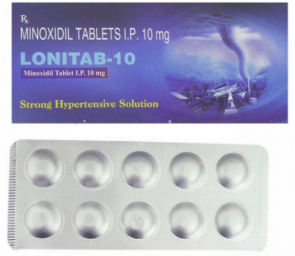 Pills and a box of generic Minoxidil 10mg
