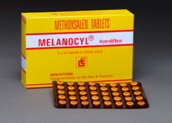 A box and strip of Methoxsalen (10mg) Tablet