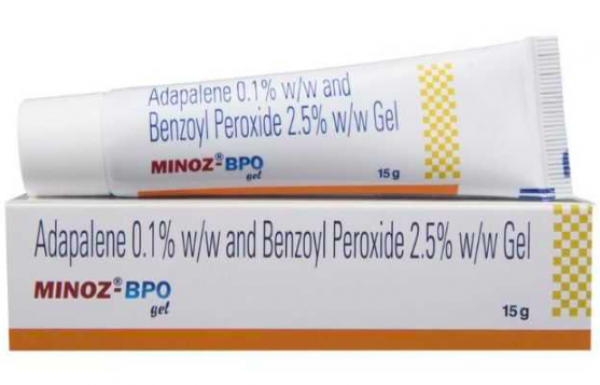 A box and a tube of generic Adapalene (0.1% w/w) + Benzoyl Peroxide (2.5% w/w)